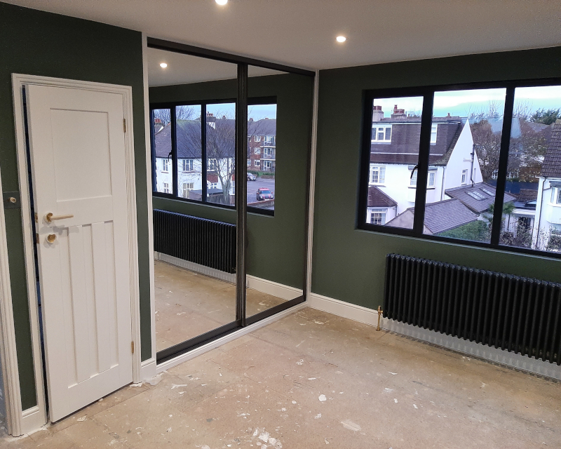 Mirror Wardrobe Doors Reflecting The Outside Creating An Illusion of Space